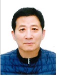 谭 